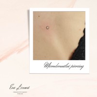 /album/fotogalerie-piercing/microdermal-mezi-prsy-jpg/